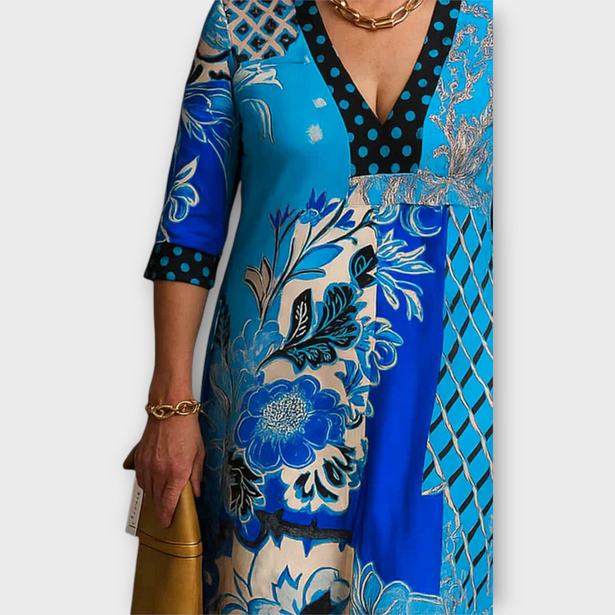 Dress with Elegant Neckline and Unique Designs