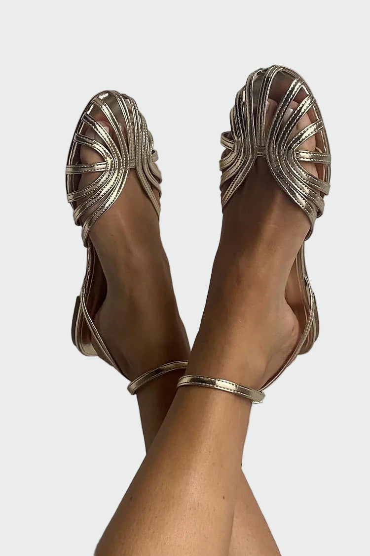 Flat sandals with woven straps