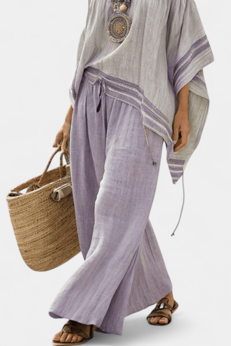 Bamboo lounge set with stripes, featuring off-shoulder design and wide trousers for a chic and fresh style
