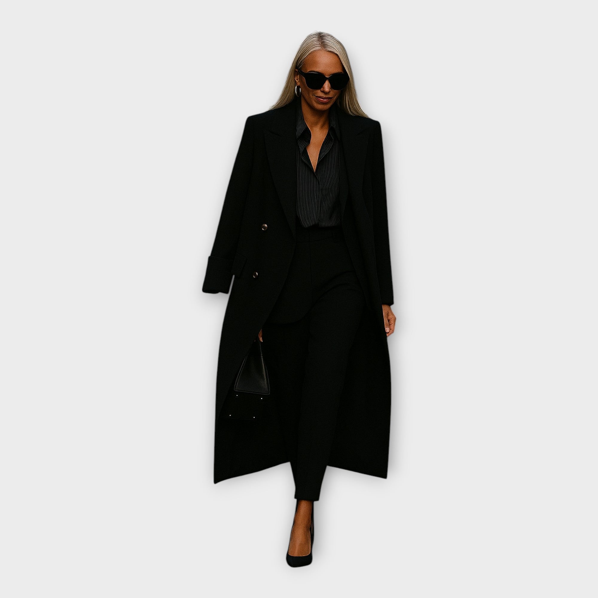 Elegant set with trousers and coat in a minimal line