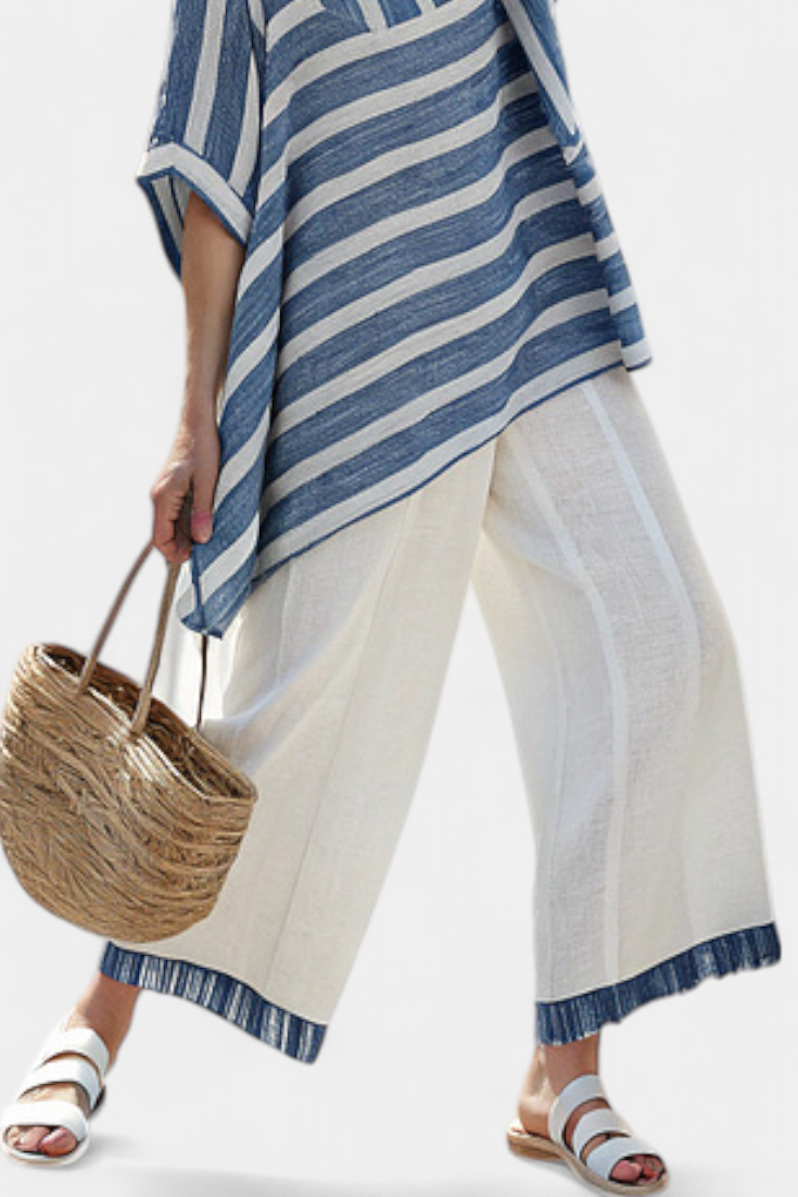 Elegant Mediterranean Linen Set with Blue Stripes and Trousers with Hem for a Fresh and Stylish Look