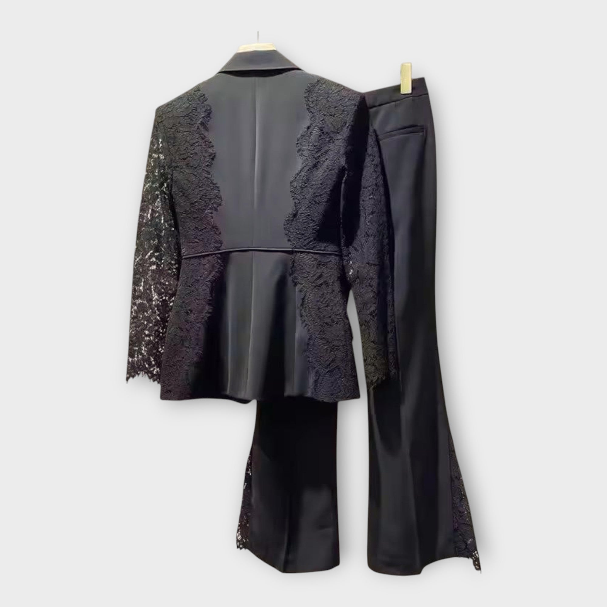 Elegant jacket and trouser set with lace details